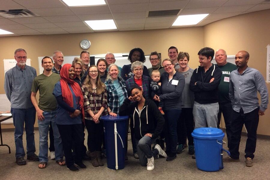 The volunteers, board members, trainers, and graduating class of AVFCW's 2018 Water Workshop.